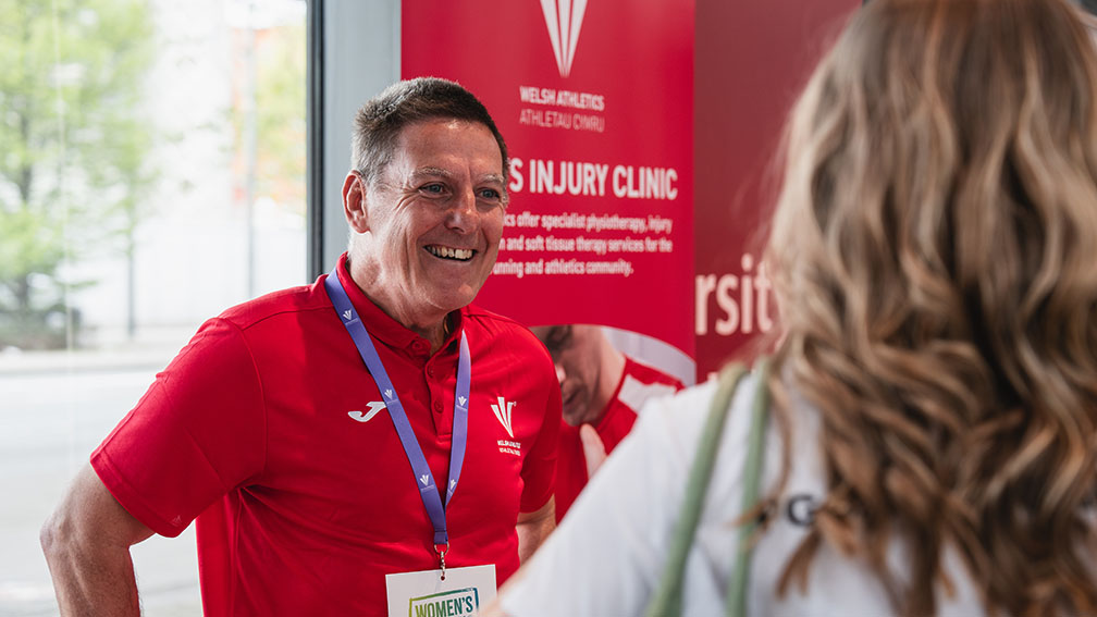 Dave Rowe giving advice to an event attendee